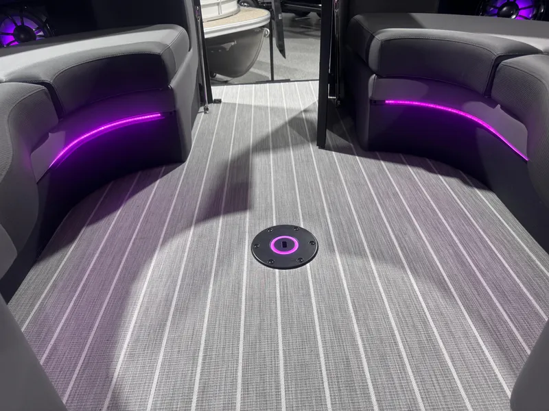 Slide: The Image of 2024 Berkshire 23 RFX DC STS3-93 interior with purple LED lighting and striped flooring. - 8