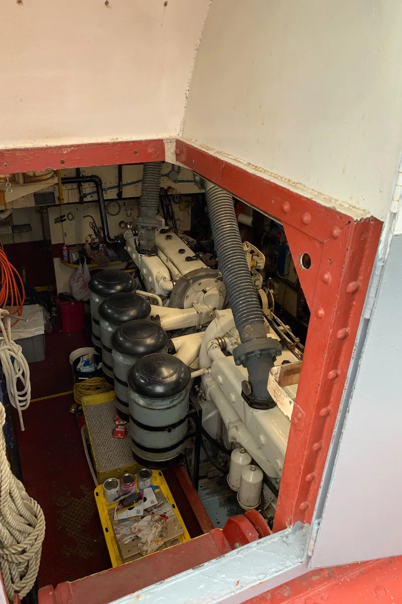 Slide: The Image of Engine room of 1936 Tugboat Bow Steel, showcasing machinery and equipment. - 16