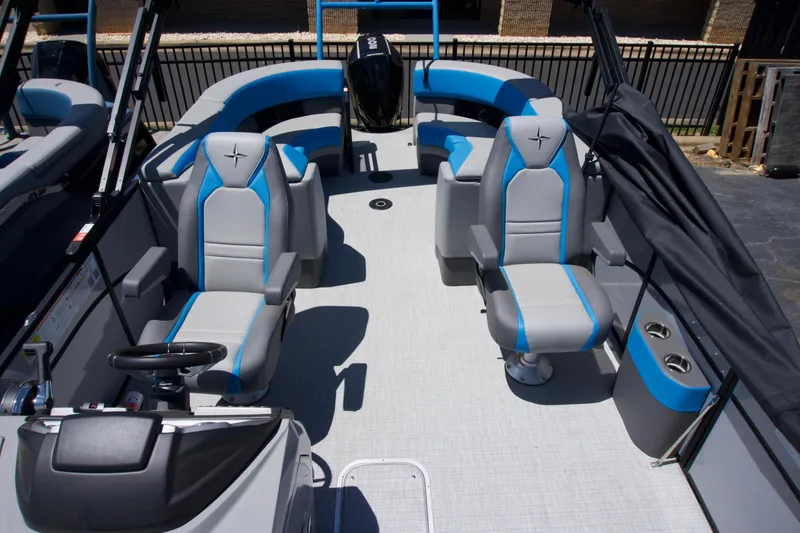 Slide: The Image of 2024 Berkshire 23RFX-STS3 boat interior with modern seating and sleek design. - 3