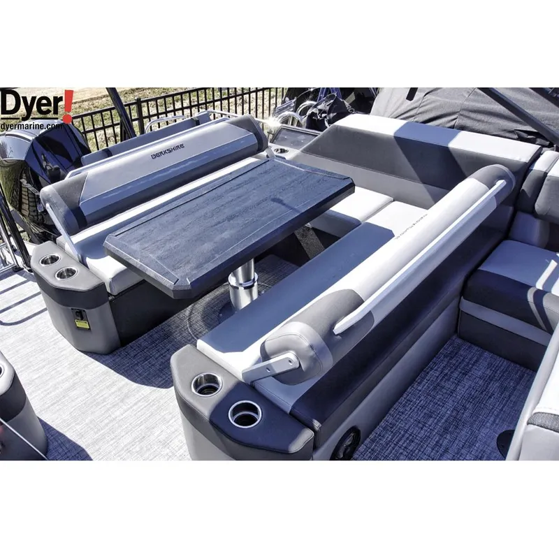 Slide: The Image of 2024 Berkshire 23SBE STS3-93 pontoon boat interior with seating and table. - 12