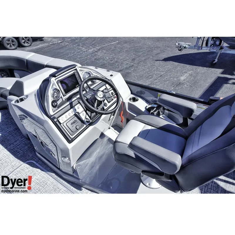 Slide: The Image of 2024 Berkshire 23SBE STS3-93 boat interior with steering console and seating. - 8