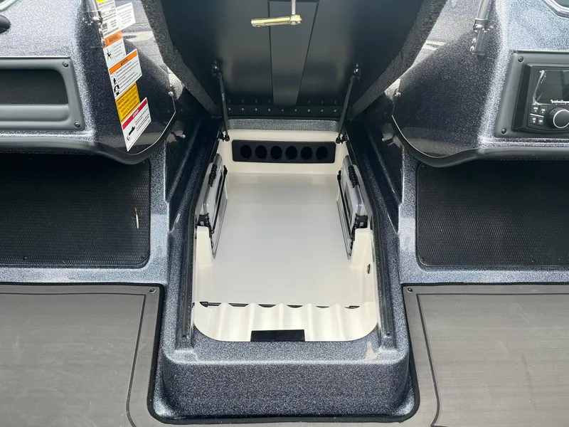 Slide: The Image of 2025 Lund 189 Tyee GL boat interior storage compartment, featuring sleek design and ample space. - 18