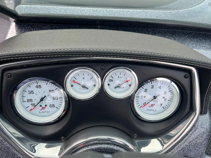 Slide: The Image of Dashboard of 2025 Lund 189 Tyee GL boat with speedometer and gauges. - 21