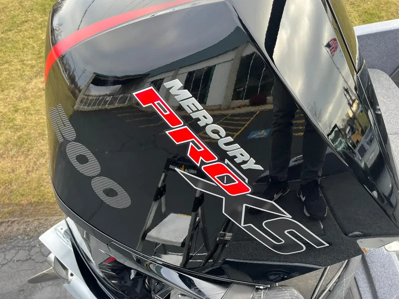 Slide: The Image of Mercury Pro XS engine on 2025 Lund 189 Tyee GL boat, outdoor setting. - 24