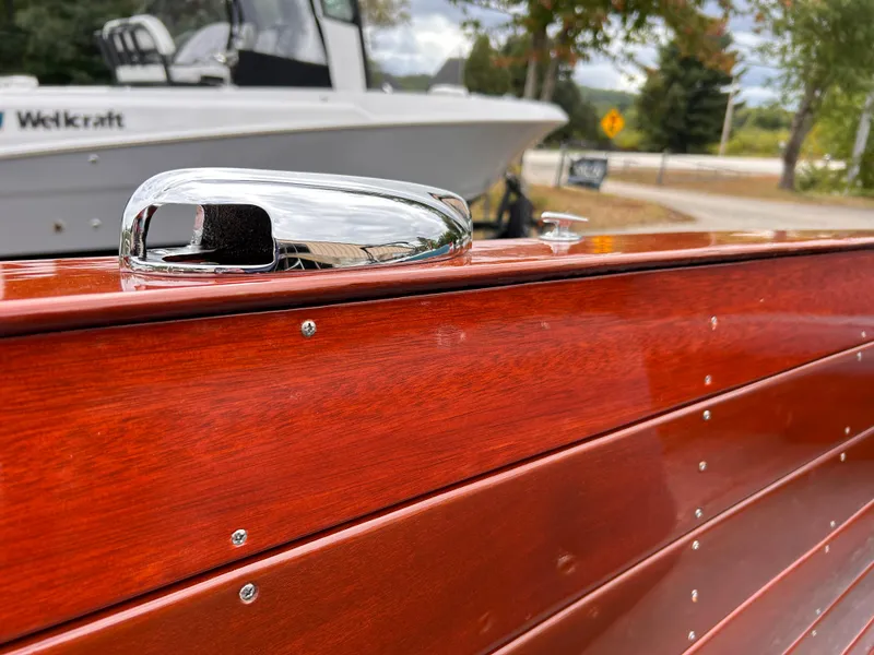 Slide: The Image of 1953 Chris-Craft 22 Sportsman boat with polished wood and chrome details. - 24