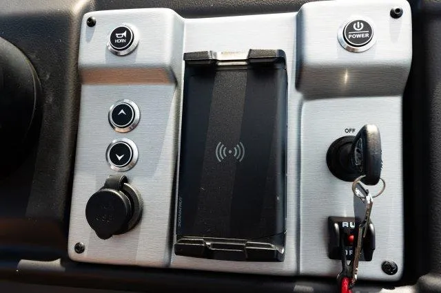 Slide: The Image of Control panel of 2023 Berkshire 24ULE-STS3 with buttons and key ignition. - 9