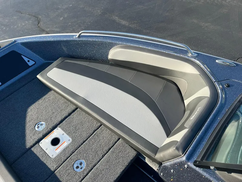 Slide: The Image of 2025 Lund 189 Tyee GL boat interior with cushioned seating and storage compartments. - 14