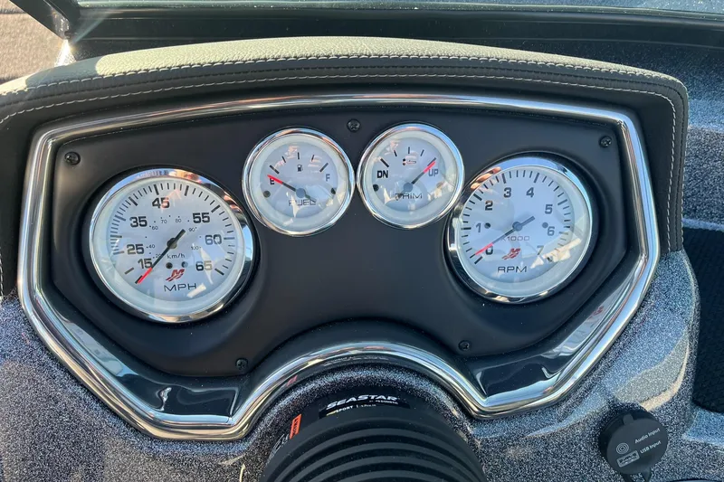Slide: The Image of Dashboard of 2025 Lund 189 Tyee GL boat with speedometer and RPM gauges. - 27
