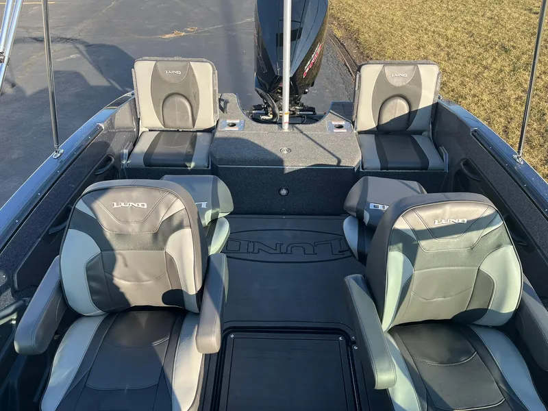 Slide: The Image of 2025 Lund 189 Tyee GL boat interior with four cushioned seats. - 9