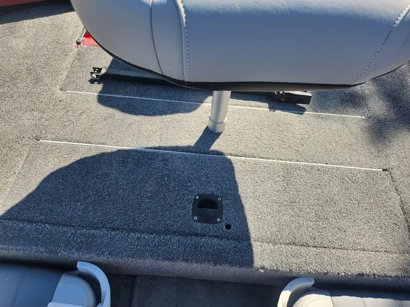 Slide: The Image of 2018 Tracker Pro 170 boat interior with gray carpet and seating. - 20