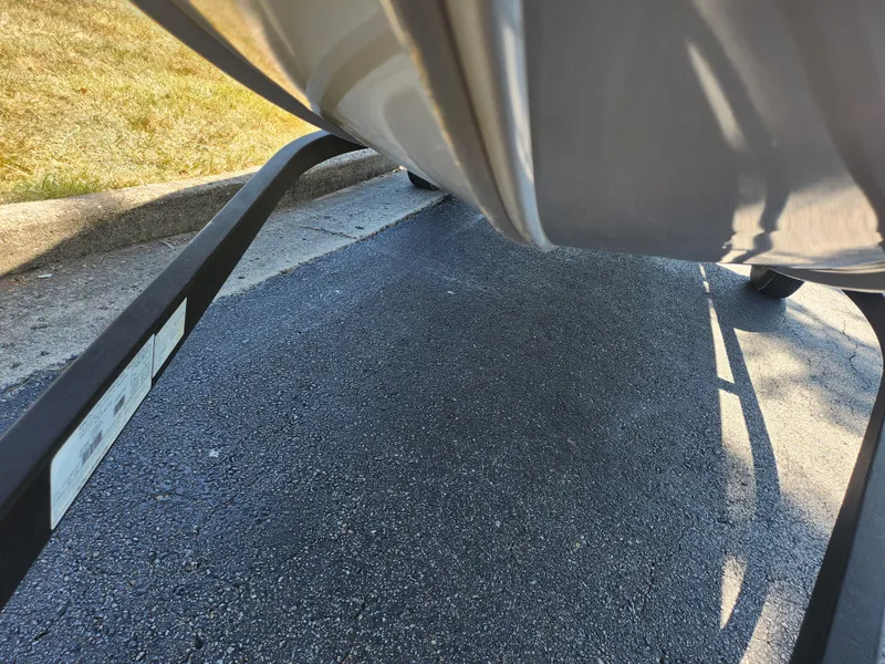 Slide: The Image of 2018 Tracker Pro 170 boat on trailer, parked on asphalt. - 7