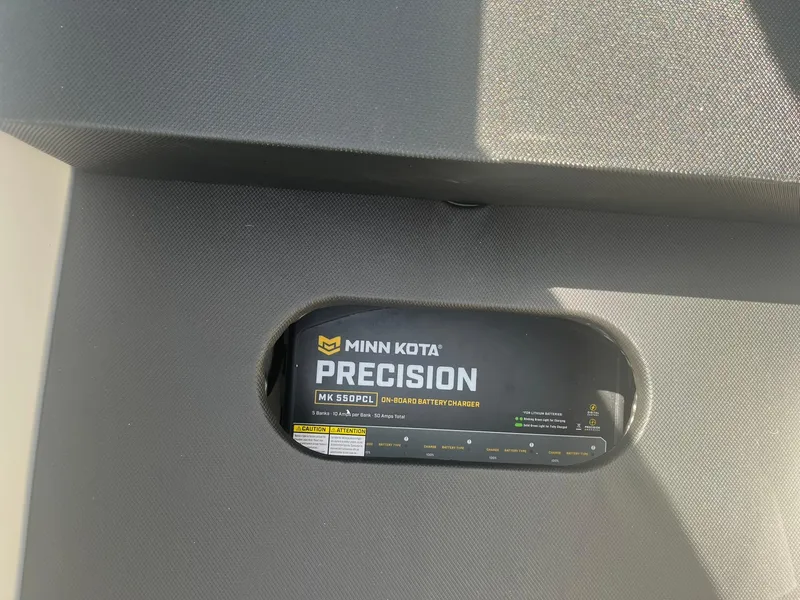 Slide: The Image of Minn Kota Precision battery charger in 2025 Lund 202 Pro-V GL boat. - 19