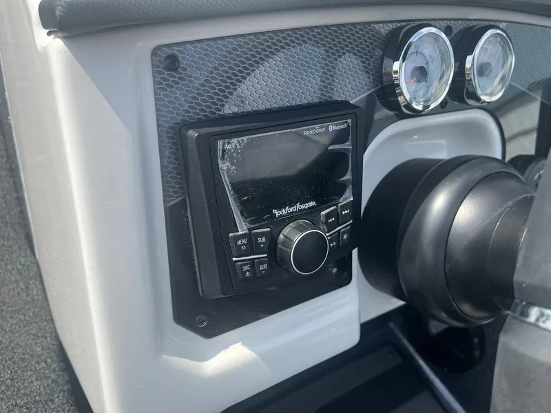Slide: The Image of Dashboard of 2025 Lund 202 Pro-V GL boat with Rockford Fosgate stereo system. - 26