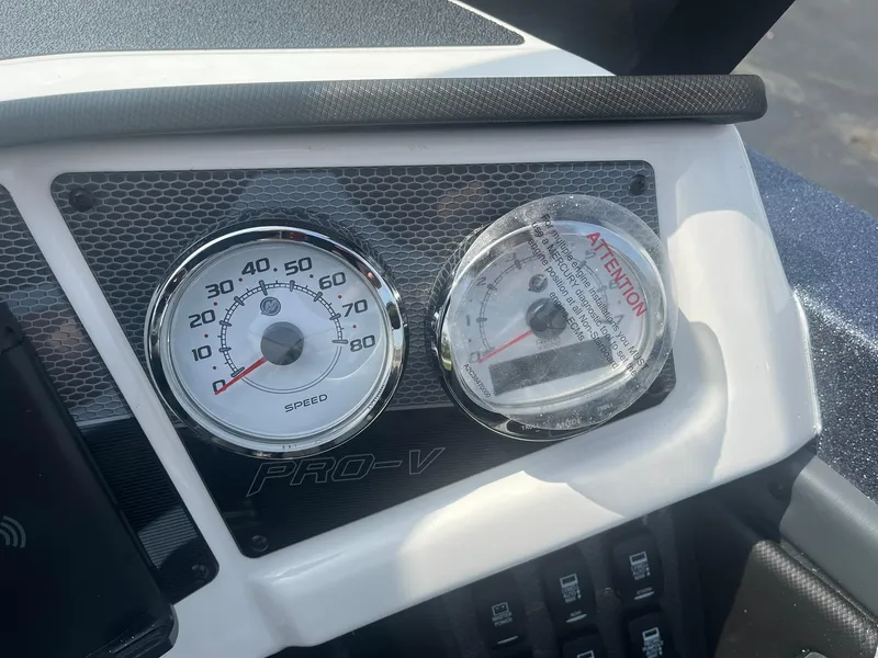Slide: The Image of Dashboard of 2025 Lund 202 Pro-V GL boat with speedometer and gauge. - 28