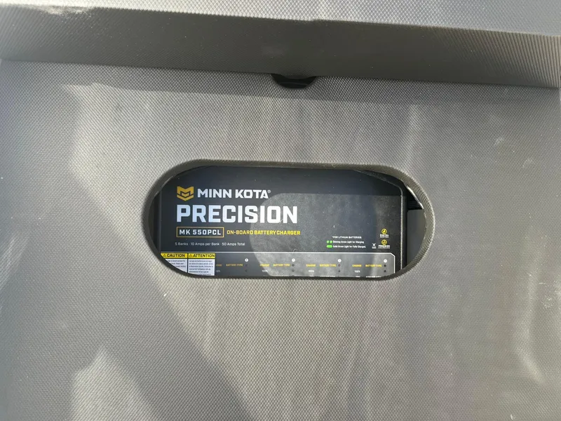Slide: The Image of Minn Kota Precision MK 550PCL on-board battery charger in 2025 Lund 202 Pro-V GL boat. - 24