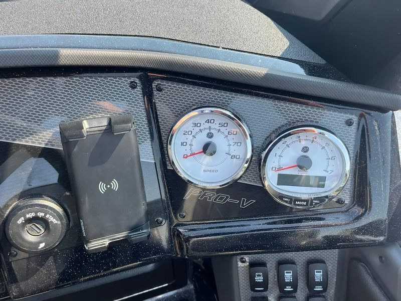 Slide: The Image of Dashboard of 2025 Lund 202 Pro-V GL boat with speedometer and RPM gauges. - 25