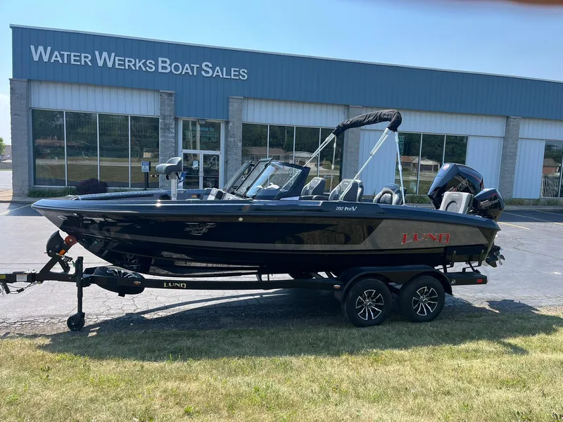 Slide: The Image of 2025 Lund 202 Pro-V GL boat displayed at Water Werks Boat Sales dealership. - 3