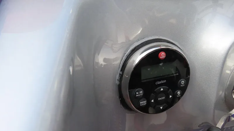 Slide: The Image of Control panel on a 2005 Cigarette 39' Top Gun Unlimited boat dashboard. - 19