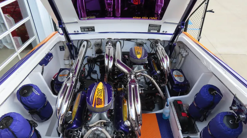 Slide: The Image of 2005 Cigarette 39' Top Gun Unlimited engine compartment with high-performance components. - 21