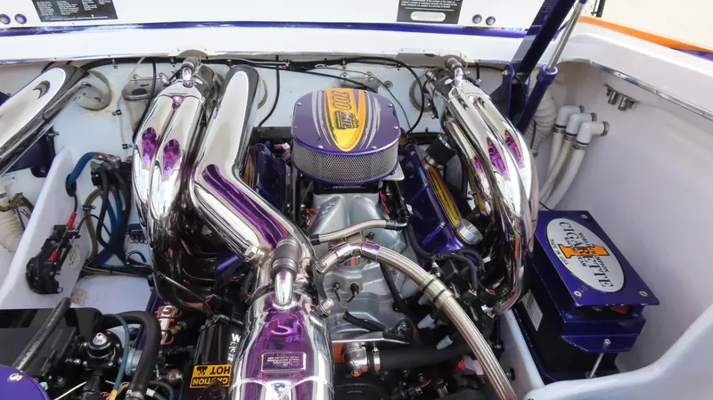 Slide: The Image of Engine of 2005 Cigarette 39' Top Gun Unlimited with chrome components and performance features. - 23