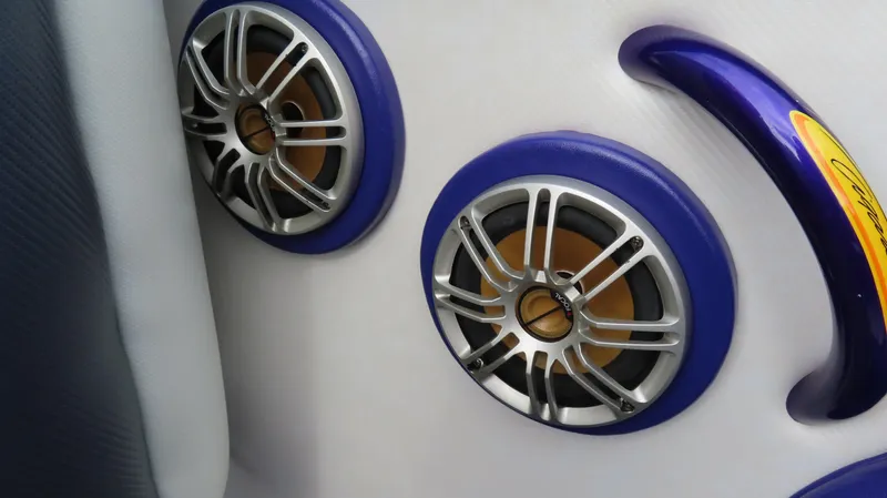 Slide: The Image of Speakers and handle on 2005 Cigarette 39' Top Gun Unlimited boat interior. - 25