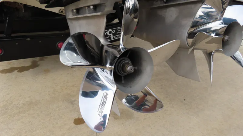 Slide: The Image of Chrome propellers of a 2005 Cigarette 39' Top Gun Unlimited boat. - 34