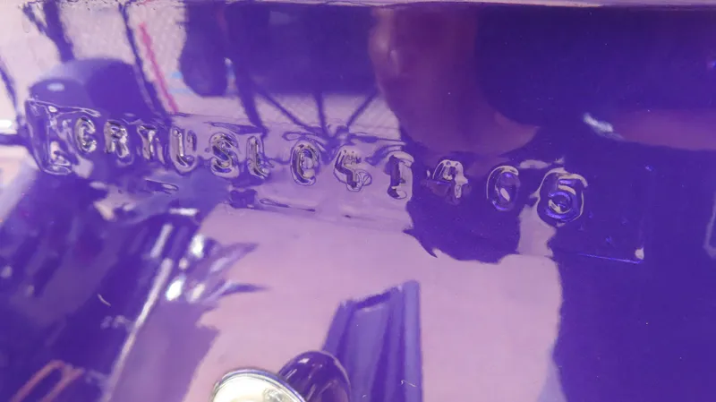 Slide: The Image of 2005 Cigarette 39' Top Gun Unlimited boat hull identification number. - 35