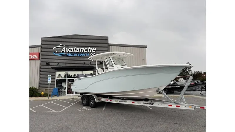The Image of 2025 Sea Fox 288 Commander boat on trailer outside Avalanche Motorsports building. - 1