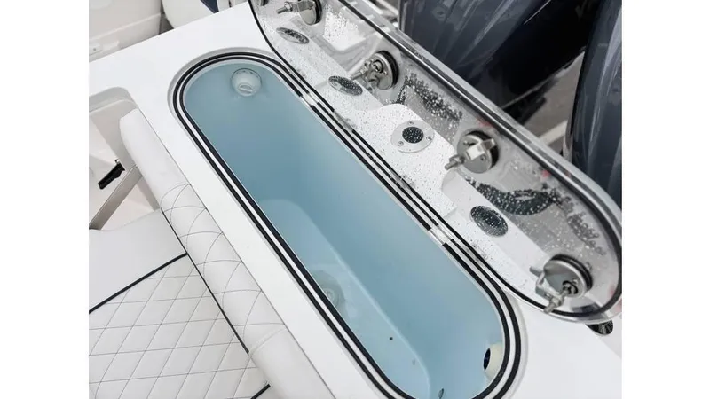 Slide: The Image of 2025 Sea Fox 288 Commander livewell with clear lid and sleek design. - 10