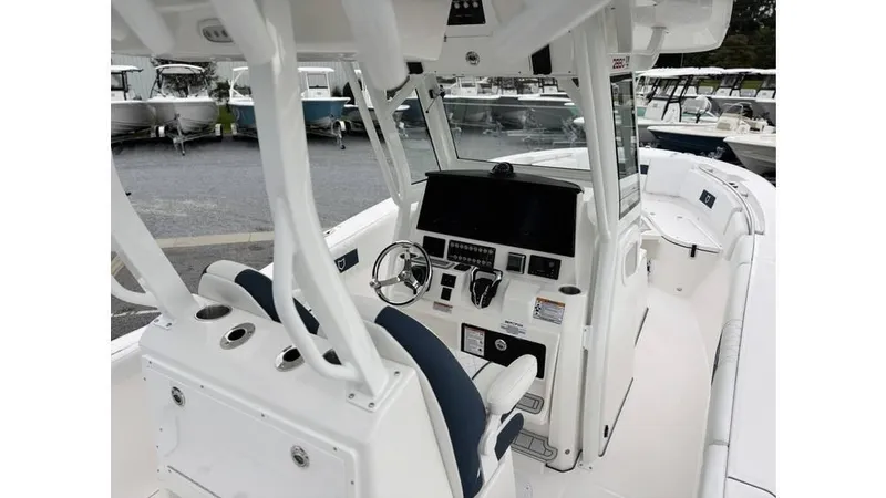 Slide: The Image of 2025 Sea Fox 288 Commander boat interior with modern helm and seating. - 5