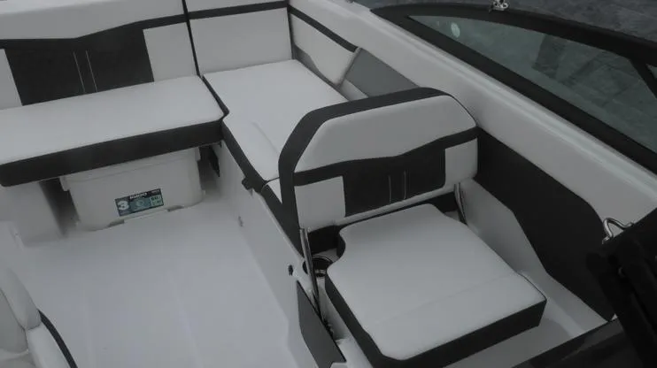 Slide: The Image of 2025 Monterey M-205 boat interior with white and black seating arrangement. - 4