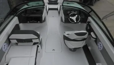 Slide: The Image of 2025 Monterey M-205 boat interior with modern seating and steering wheel. - 6