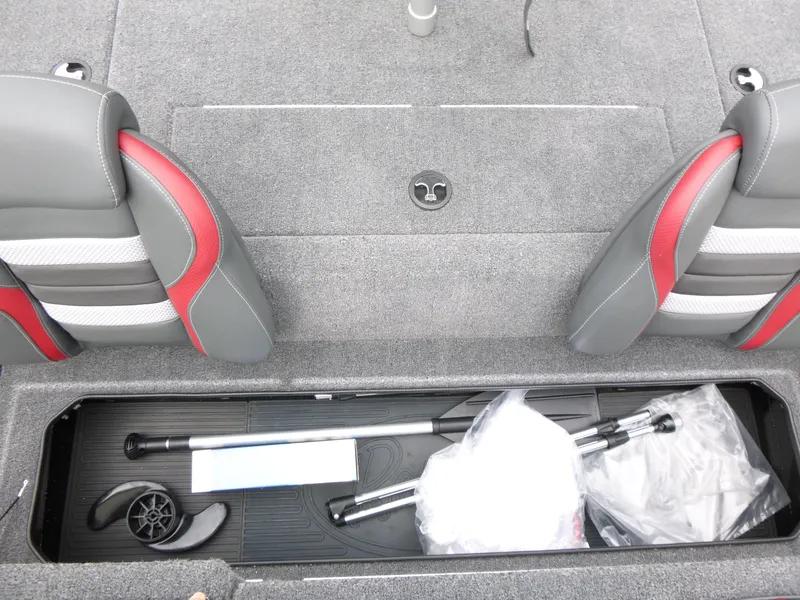 Slide: The Image of 2024 Ranger RT188 boat interior storage compartment with accessories and seating. - 11