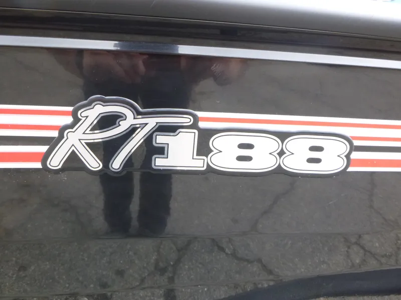 Slide: The Image of 2024 Ranger RT188 logo with red and white stripes on a black surface. - 15