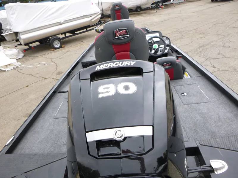 Slide: The Image of 2024 Ranger RT188 boat with Mercury 90 engine, black and red interior. - 3