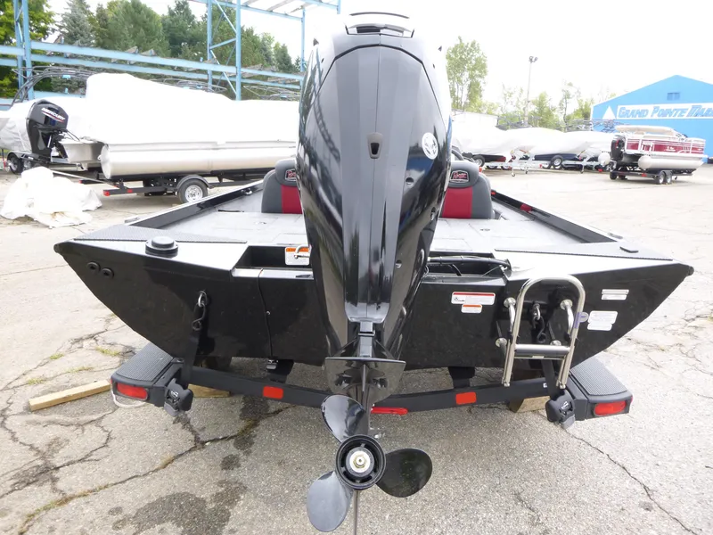 Slide: The Image of 2024 Ranger RT188 boat rear view with outboard motor and ladder. - 4
