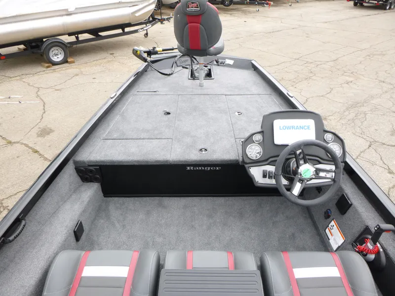 Slide: The Image of 2024 Ranger RT188 boat interior with steering wheel and seating. - 5