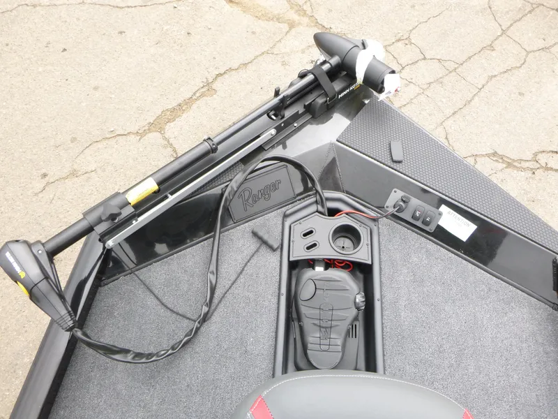 Slide: The Image of 2024 Ranger RT188 boat deck with trolling motor and control panel. - 7