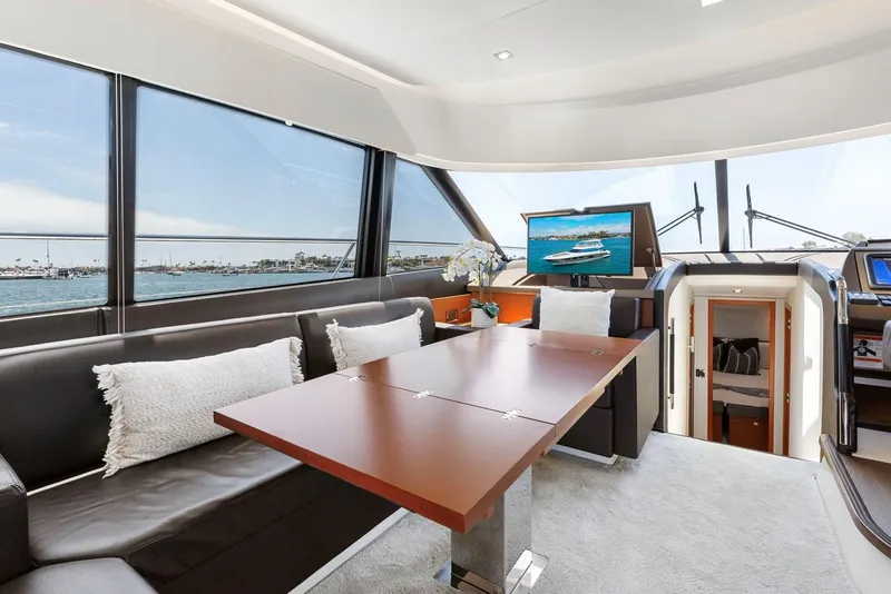 Slide: The Image of Luxurious interior of 2016 Prestige 550 yacht with elegant seating and sea view. - 17