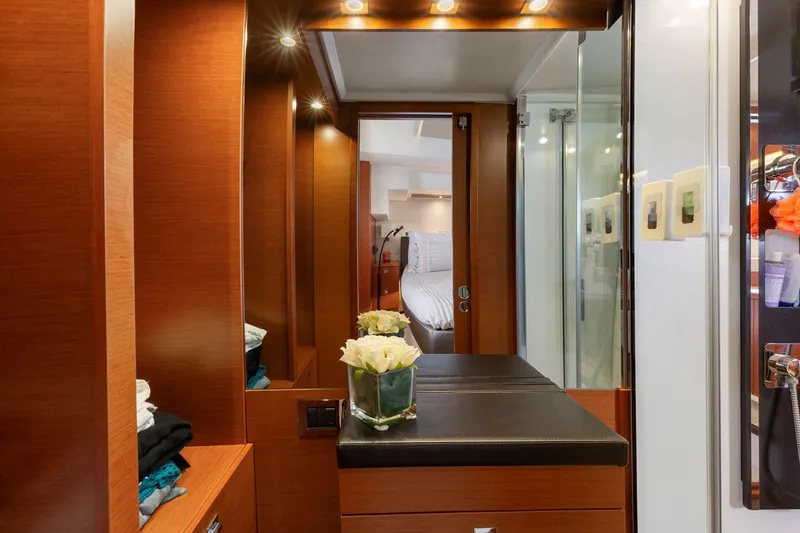 Slide: The Image of Luxurious interior of 2016 Prestige 550 yacht with elegant wood finish and modern amenities. - 32