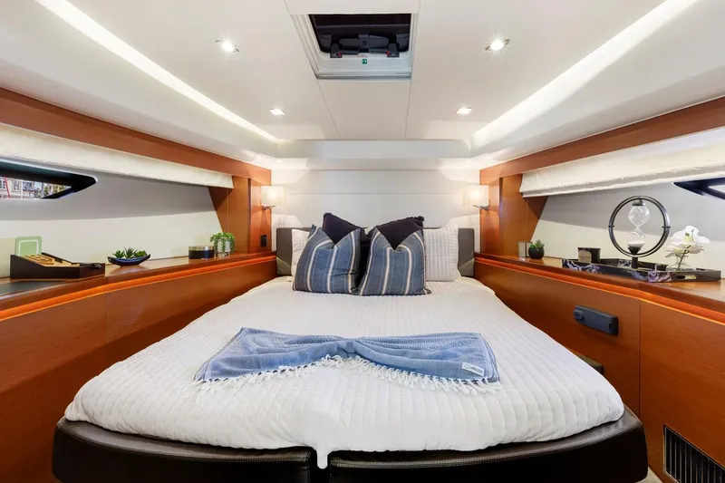 Slide: The Image of Luxurious cabin interior of 2016 Prestige 550 yacht with elegant bedding and decor. - 36