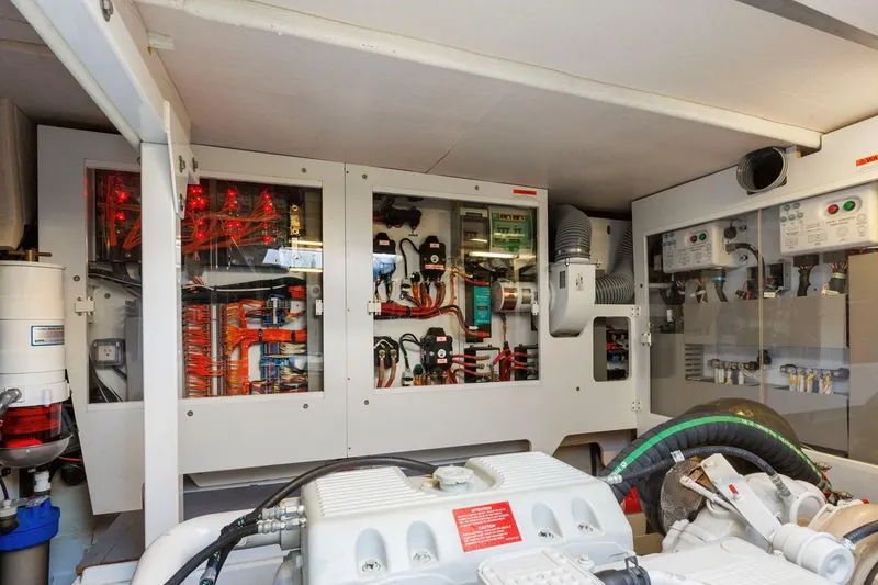 Slide: The Image of Engine room of 2016 Prestige 550 yacht with electrical panels and machinery. - 41