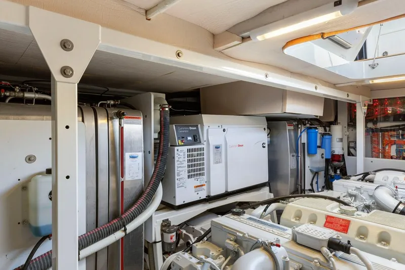 Slide: The Image of Engine room of 2016 Prestige 550 yacht with modern equipment and machinery. - 42