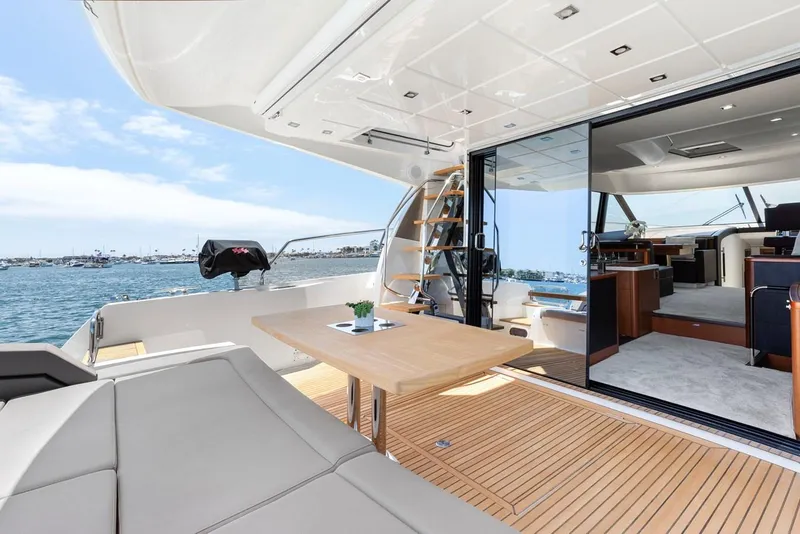 Slide: The Image of Luxurious 2016 Prestige 550 yacht with spacious deck and modern interior. - 5