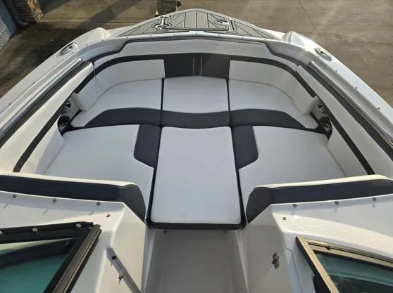 Slide: The Image of 2025 Monterey M4 boat interior with spacious seating and modern design. - 1