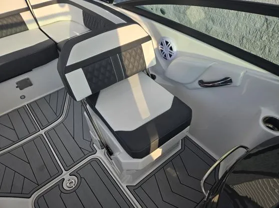 Slide: The Image of 2025 Monterey M4 boat interior with sleek seating and modern design. - 10
