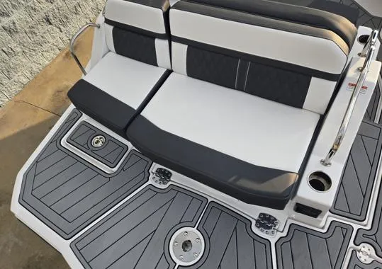Slide: The Image of Monterey M4 2025 boat seating with sleek black and white upholstery. - 5