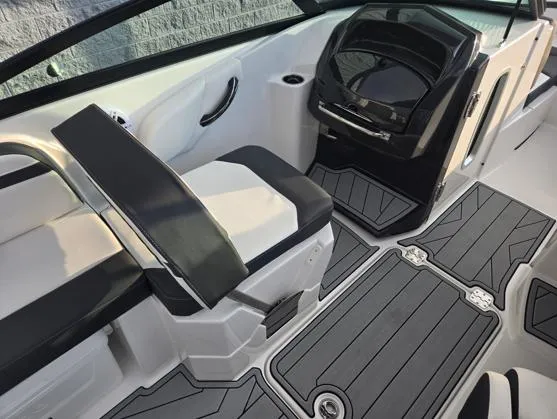 Slide: The Image of 2025 Monterey M4 boat interior with sleek seating and modern dashboard design. - 6