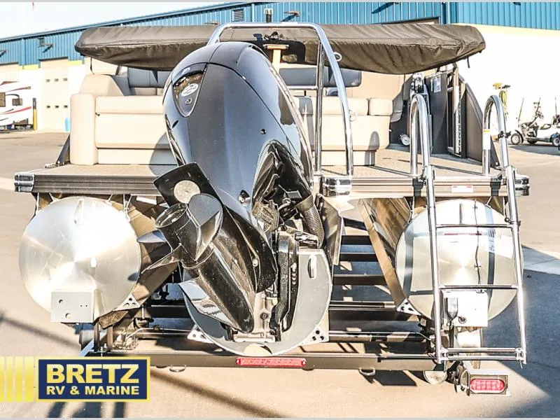 Slide: The Image of 2025 Aria Cast-N-Cruise A22CC pontoon boat with powerful outboard motor at Bretz RV & Marine. - 12