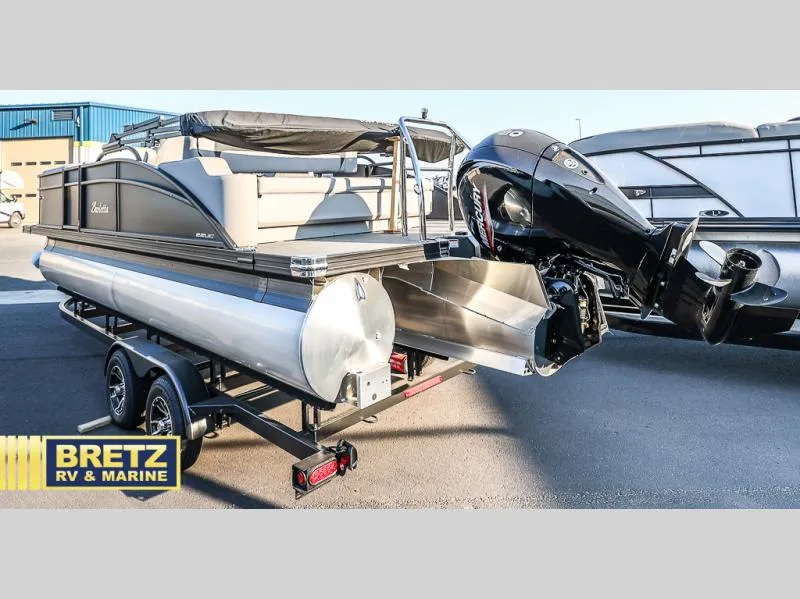 Slide: The Image of 2025 Aria Cast-N-Cruise A22CC pontoon boat with outboard motor at Bretz RV & Marine. - 13